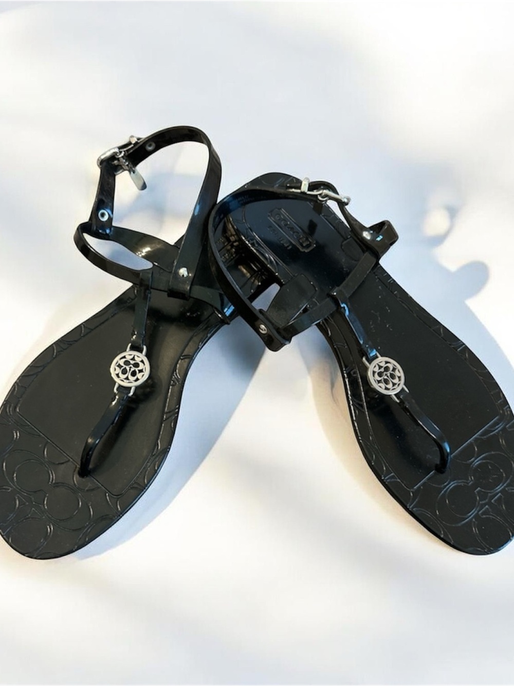 Coach Black Patent T-Strap Sandals with Silver Logo Medallion